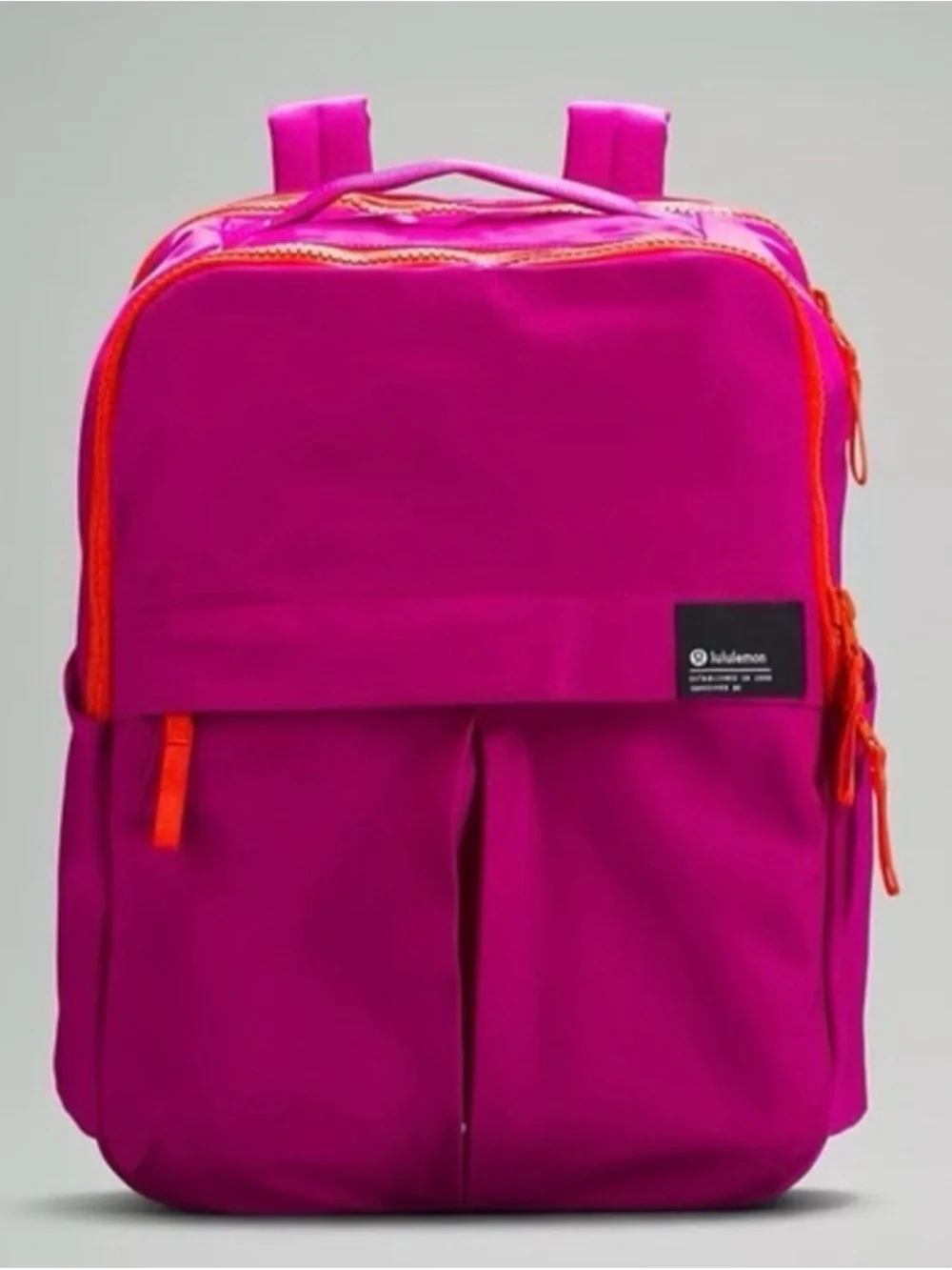 lululemon athletica Bright Magenta Backpack with Orange Trim